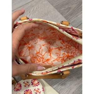 Alternative view of Lv On the go east west by the pool orange and pink