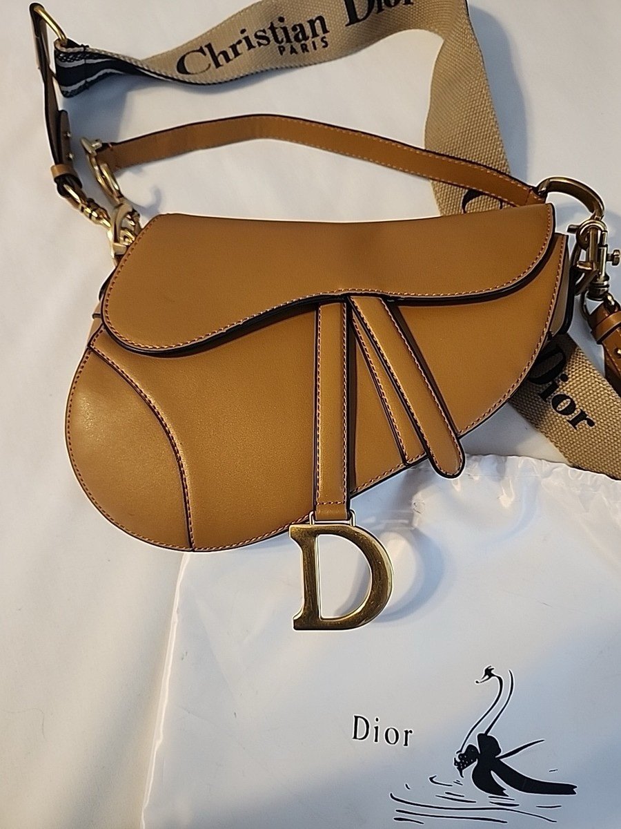 Christian Dior Medium Saddle Bag with purse strap and riding strap.