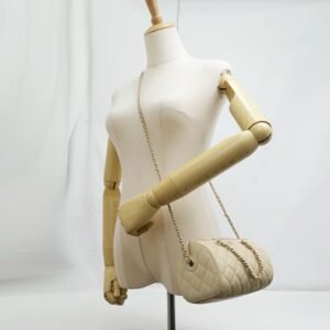 Chanel Caviar Quilted Barrel Clutch With Chain Beige